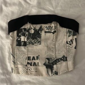 With Jean Carla corset in newsprint/ newspaper print